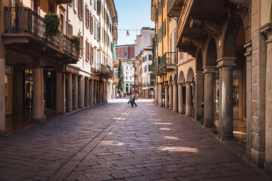 View of the city center with people walking, alleys