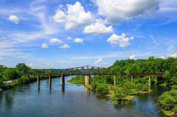 Fototapeta na wymiar Overlooking the famous White River and railroad bridge in Cotter, Arkansas 