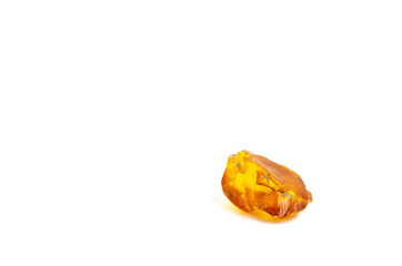 Amber stone on isolated background. Sun stone on a white background.