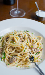 Pasta with meatballs, marinara sauce, Parmesan cheese and fresh Italian parsley. Classic American or Italian restaurant favorite. Homemade pasta with sauces, meats and cheeses.