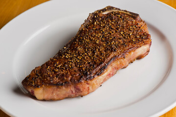 Steak. Grass-fed skirt steak, grilled to a medium rare and served with a garlic herb butter sauce and paired with roasted potatoes and Brussels sprouts. Classic American steakhouse favorite.