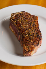 Steak. Grass-fed skirt steak, grilled to a medium rare and served with a garlic herb butter sauce and paired with roasted potatoes and Brussels sprouts. Classic American steakhouse favorite.