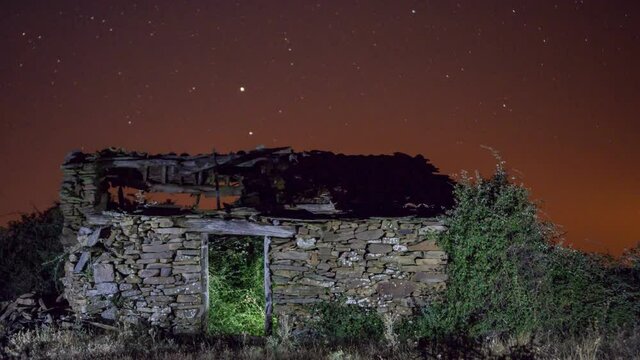 Ruined building night time lapse with plane trails