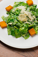Salad. Classic American or French restaurant salad made w/ kale, Arugula, almonds, blueberries, walnuts, tomatoes, bacon, blue cheese, avocado, tossed w/ olive oil.