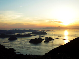Sunset view of the Kurushima-Kaikyo Bridges from Kiro-san Observatory Park, Seto Inland Sea, JAPAN....