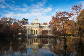 Crystal palace and lake in Retiro park in Madrid, Spain.