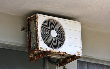 old rusty air conditioner unit