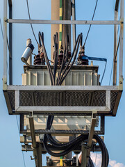 An overhead electrical line with a transformer