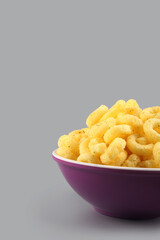 Pile of Cheese crispy Corn ring snack	
