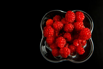 raspberry on black background