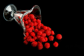 raspberry on black background