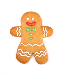 happy gingerbread man covered in icing isolated on a white background