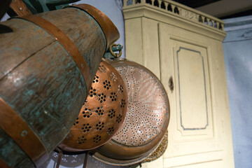 old kitchen with a copper strainer
