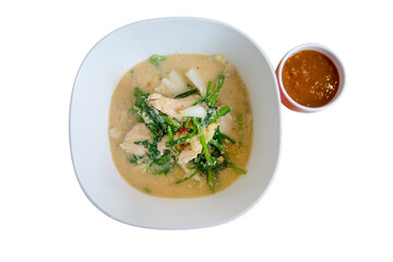 Top view of Suki in broth in white bowl, focus selective.