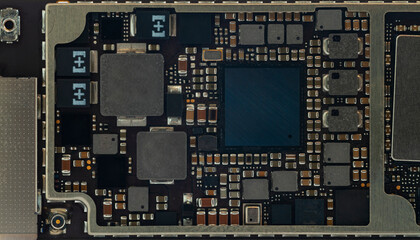 Smart phone components, circuit board from the modern mobile phone with CPU RAM chips and other electronic components.