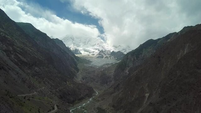 The background of Nanga Parbat Mountain locally known as Diamer, is the ninth highest mountain in the world at 8,126 metres above sea level.
