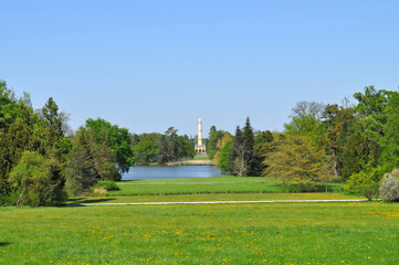 Fototapeta na wymiar Park with a lake with a minaret in the background (Lednice Castle, Czech Republic)