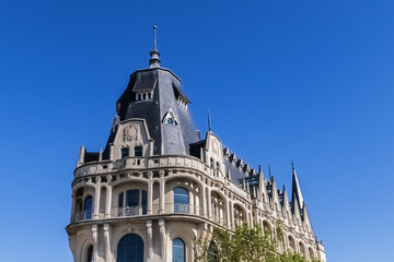 Naklejka premium Architectural fragments of Chartres Neo-gothic style building at Boulevard Maurice Viollette. Chartres, Eure-et-Loir department, France.