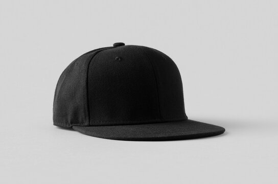 Black snapback cap mockup on a grey background.