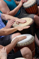 Tam-Tams drum circle with djembe in Mount Royal Park, Montreal, Quebec, Canada. An outdoor summer...