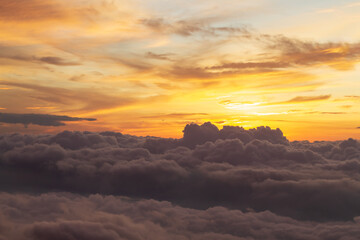 View at sunrise with puffy foggy. White puffy like cloud stretching to foggy horizon in the bright morning. Phu Thap Boek, Phetchabun, Thailand.