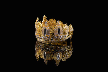 Handmade bead crown on a black background.