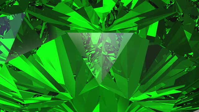 Beautiful green emerald close-up. Looping animation 4K.