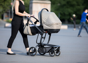 Woman with stroller walking