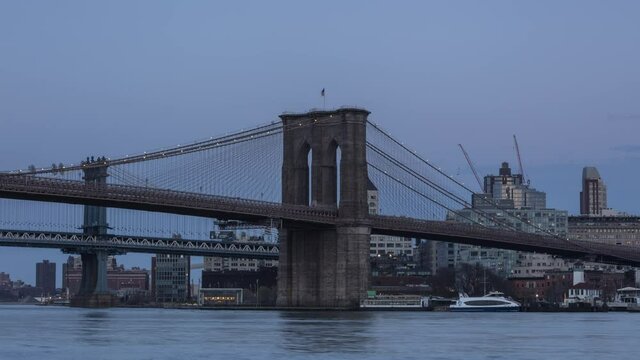 Full moonrise over Brooklyn Bridge in day to night  time lapse