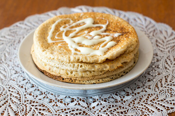 Oatmeal pancakes on a plate on a table