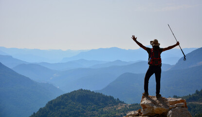 Climber on top of the mountain