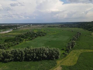 Aerial view of green hills on a cloudy day