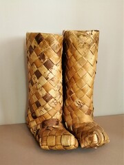 Vintage russian shoes boots and bast shoes made of brick bark