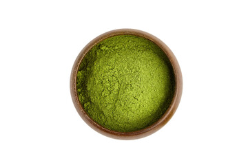 Green freeze dried wheat or barley grass powder in wooden bowl isolated on white.