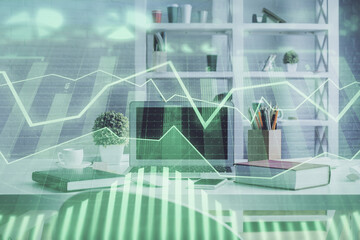 Obraz premium Double exposure of financial graph drawing and office interior background. Concept of stock market.