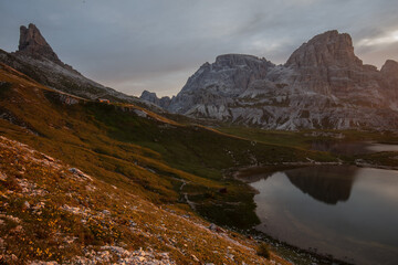 Sunrise on lake on tre cime di lavaredo Dolomites Italian alps