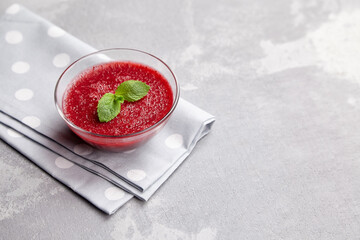 Bowl with homemade strawberry mousse dessert.