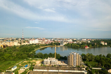 Aerial view of tall residential apartment buildings under construction. Real estate development.
