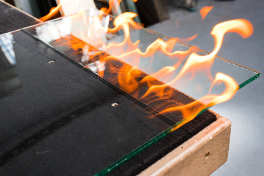 Cutting glass called VSG.  (Very Safe Glass) Fire burning the foil connecting the glass.