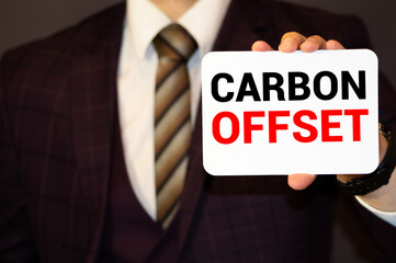 Word writing text Carbon Offset. Business concept for Reduction in emissions of carbon dioxide or...