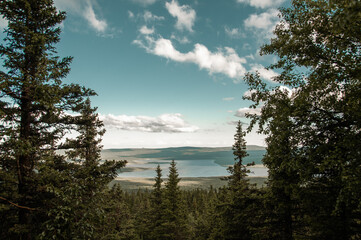 Beautiful landscape with a mountain range in nature and blue sky with white clouds
