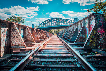 Fototapeta na wymiar Moody Boston Bridge with Railroad Tracks