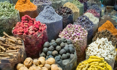Rows of spice, herbs and healthy ingredients of various shapes and colors old Deira spice souk