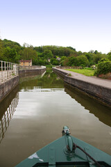 Beautiful canal in United Kingdom, featuring trees, water and boats