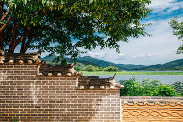 Korean traditional stone wall with river and mountain at Dumulmeori in Yangpyeong, Korea