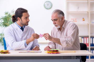 Doctor and patient suffering from Alzheimer disease