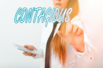 Word writing text Contagious. Business photo showcasing transmissible by direct or indirect contact with infected an individual Model with pointing hand finger symbolizing navigation progress growth