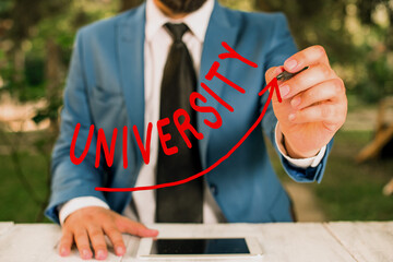 Text sign showing University. Business photo text an educational institution designed to teach and...