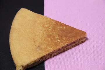 Terang Bulan is a typical Indonesian snack made from flour and mixed with chocolate. traditional food with sweet and triangular shape