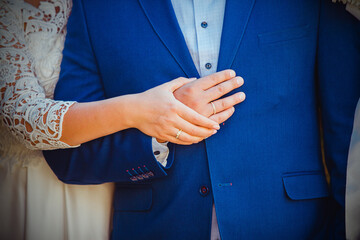 Obraz premium Hands of the newlyweds.